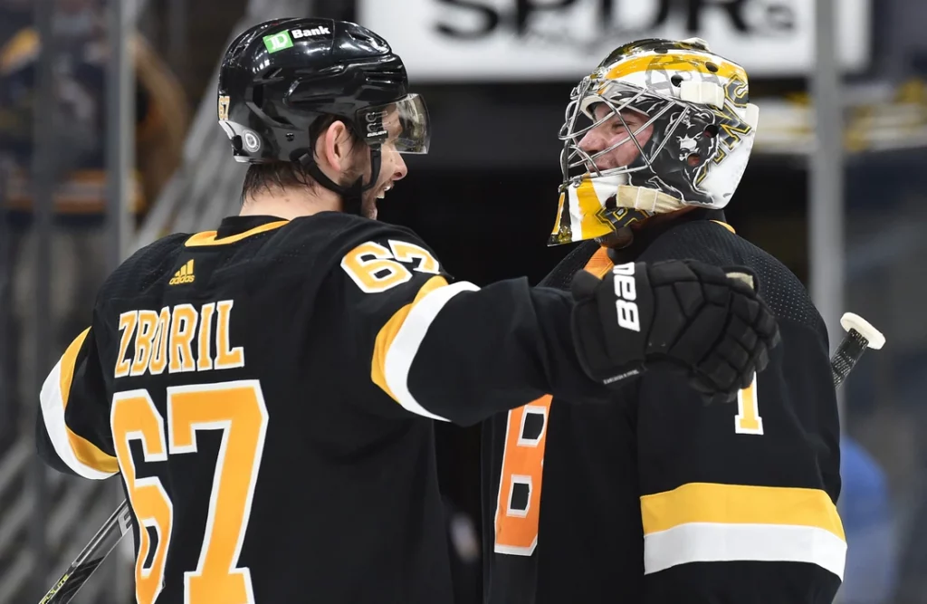 Bruins, Jeremy Swayman survive Flyers, 4-2 – Boston Herald